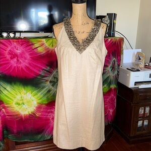 Elegant Beige Sleeveless Dress with Sequin Detail